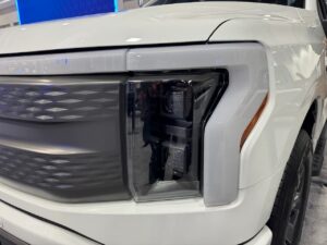 Ford electric truck headlamp and grille