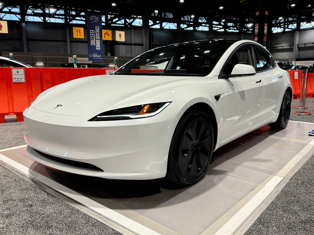 2024 Tesla Model 3 AWD white front three quarter