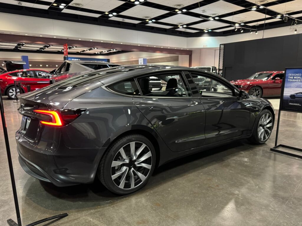 2024 Tesla Model 3 Stealth Grey rear three quarter