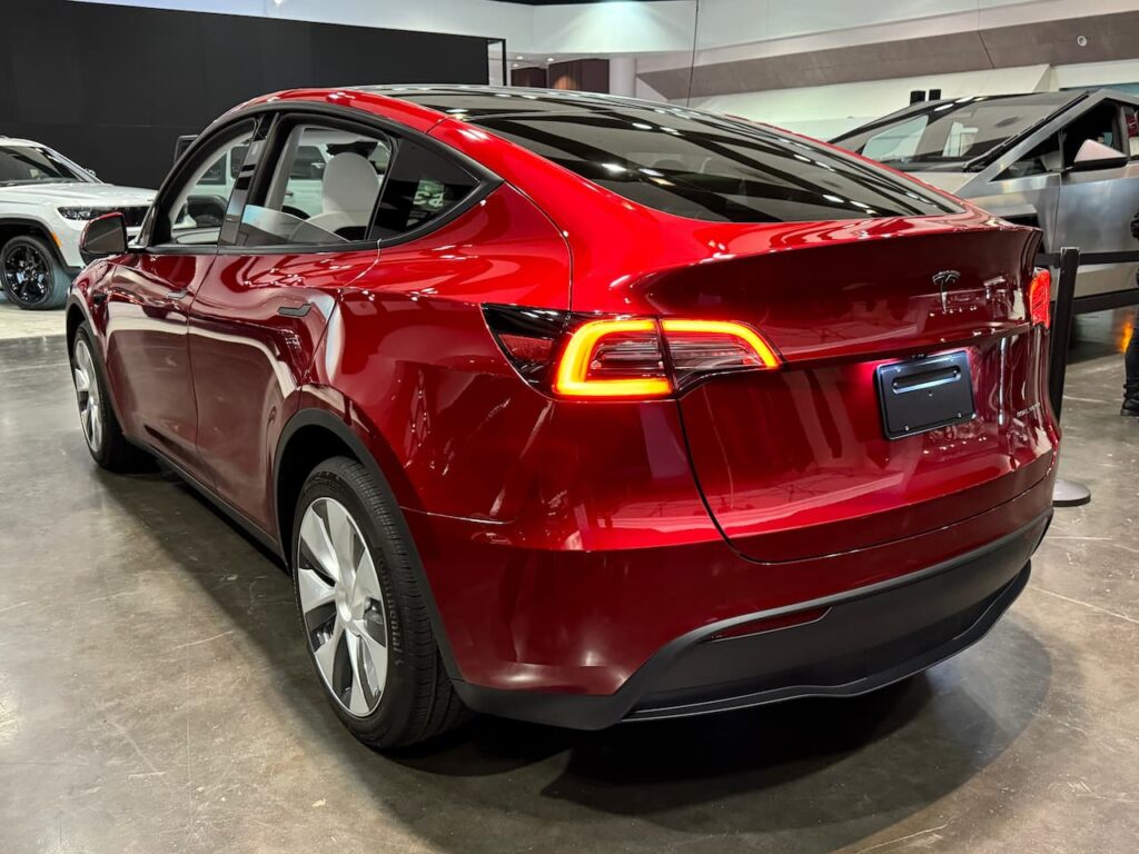 2024 Tesla Model Y Ultra Red rear three quarter