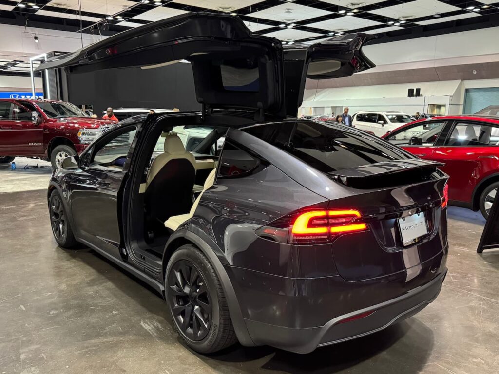 Stealth Grey 2024 Tesla Model X rear three quarter